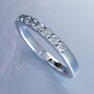 0.78 ct. E/F, VS/Top-SI, Halfset Pave Diamond Eternity Ring in Gold & Platinum